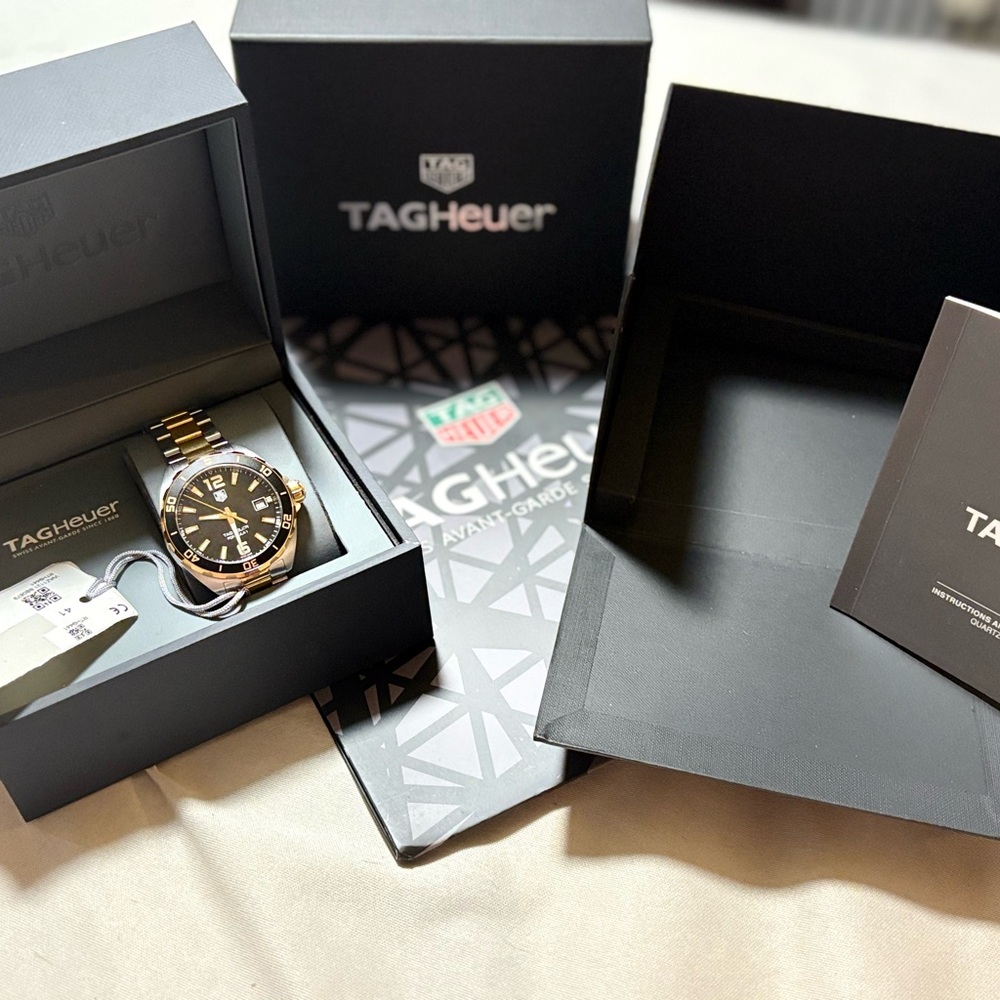 TAG Heuer Men's Black and Gold Watch very nice never worn brand new white